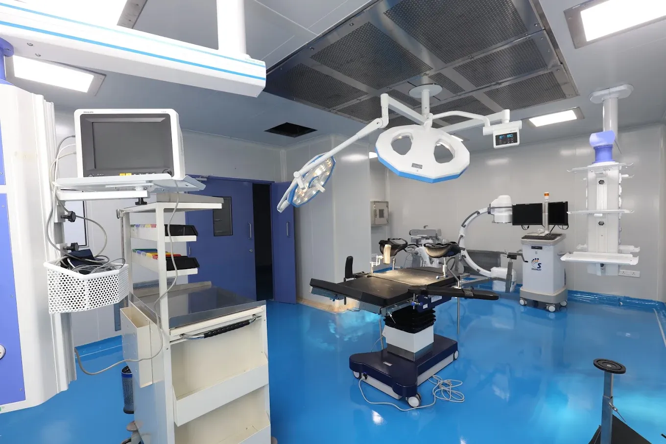 Operation theatre with C-arm imaging at Mahaveer Hospital